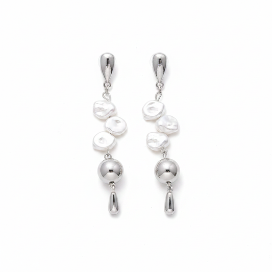 Silver Baroque Pearl Drop Earrings on white studio background
