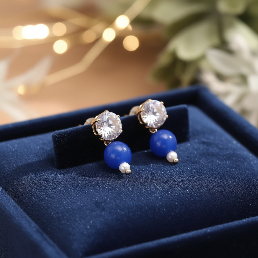 Blue Crystal Drop Earrings on navy velvet tray