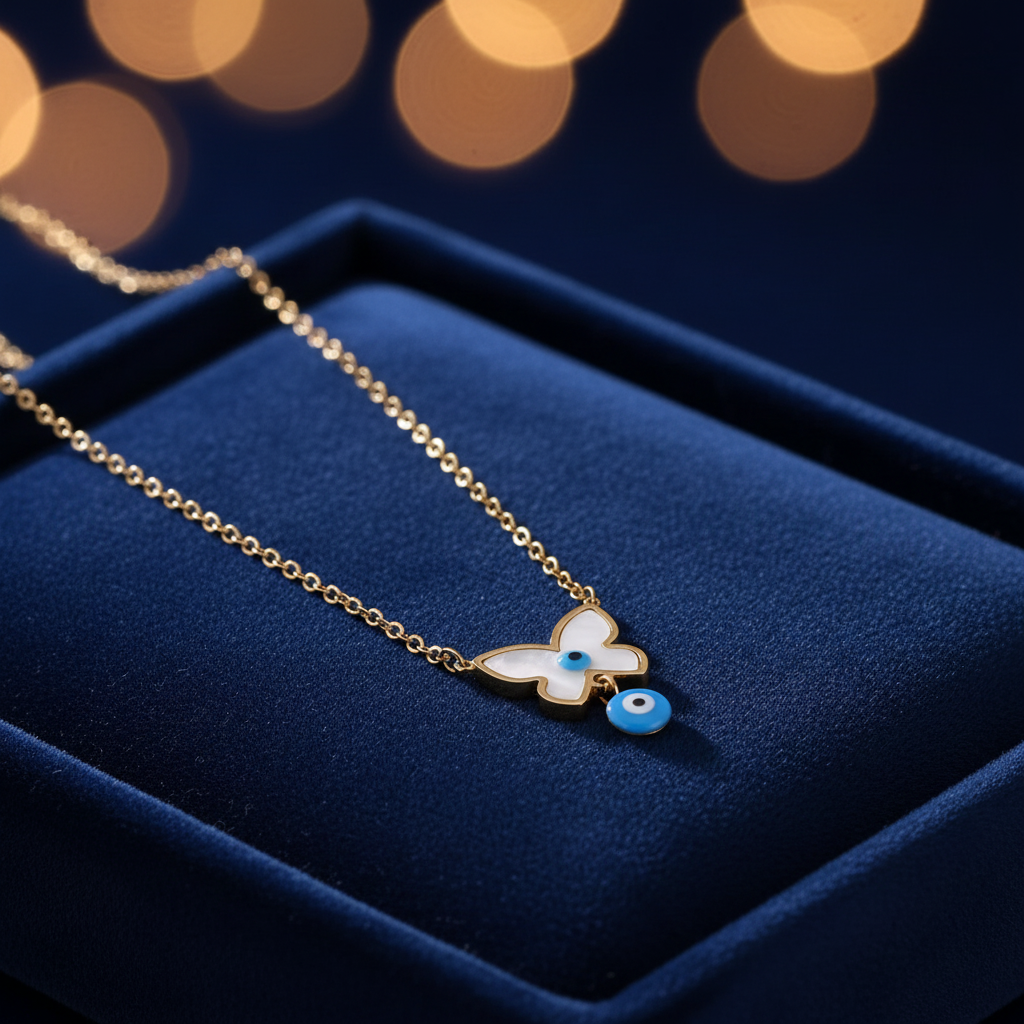 Butterfly Evil Eye Necklace on navy velvet tray