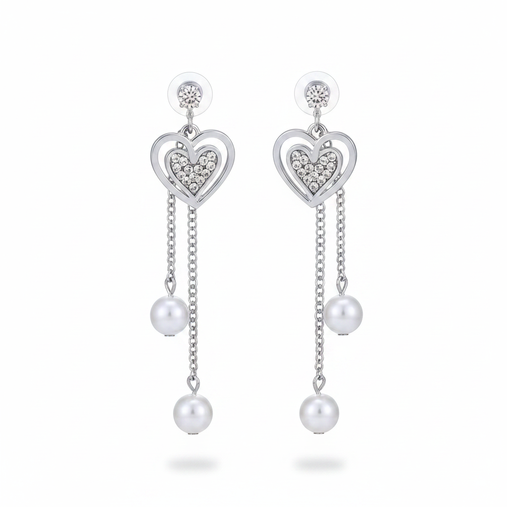 Silver heart drop earrings front view on white background